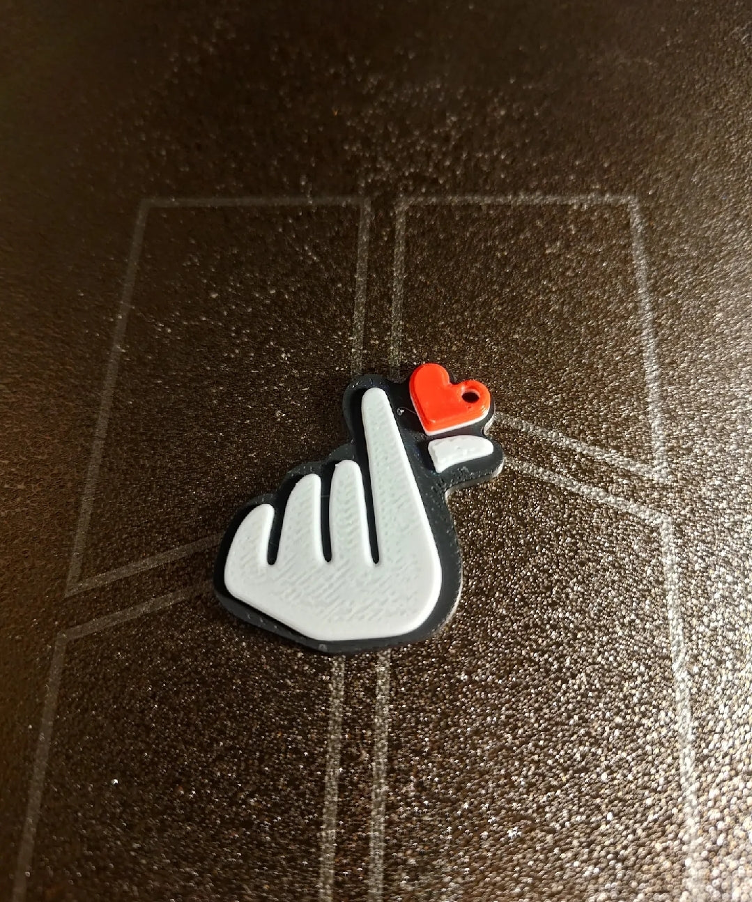 Hand with heart keychain